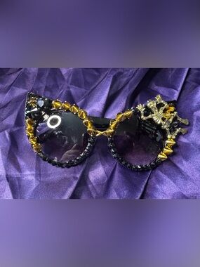 Embellished Black cat eye Sunglasses with Gold spike and skeleton Accents